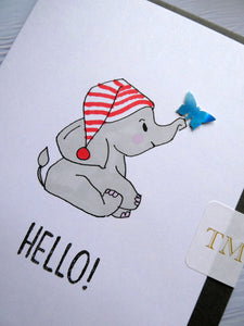 Hand drawn Greetings Card with an elephant and a butterfly saying Hello