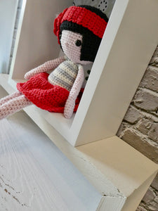Miranda the Crochet doll in a display box