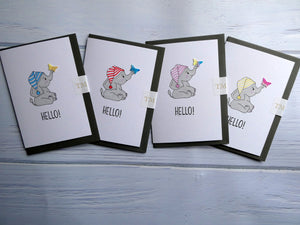 Hand drawn Greetings Card with an elephant and a butterfly saying Hello