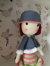 Load image into Gallery viewer, Madeline the Crochet doll in a striped dress in a display box