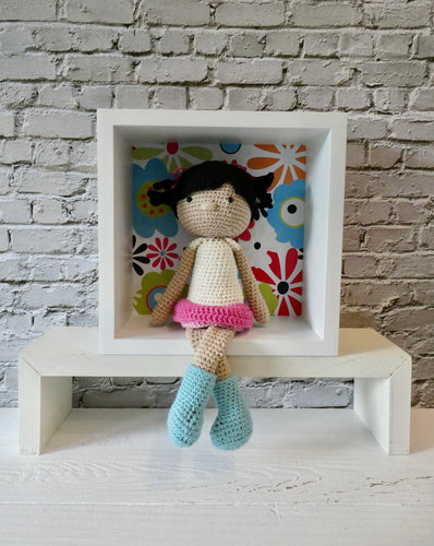 Bella the Crochet doll in a display box
